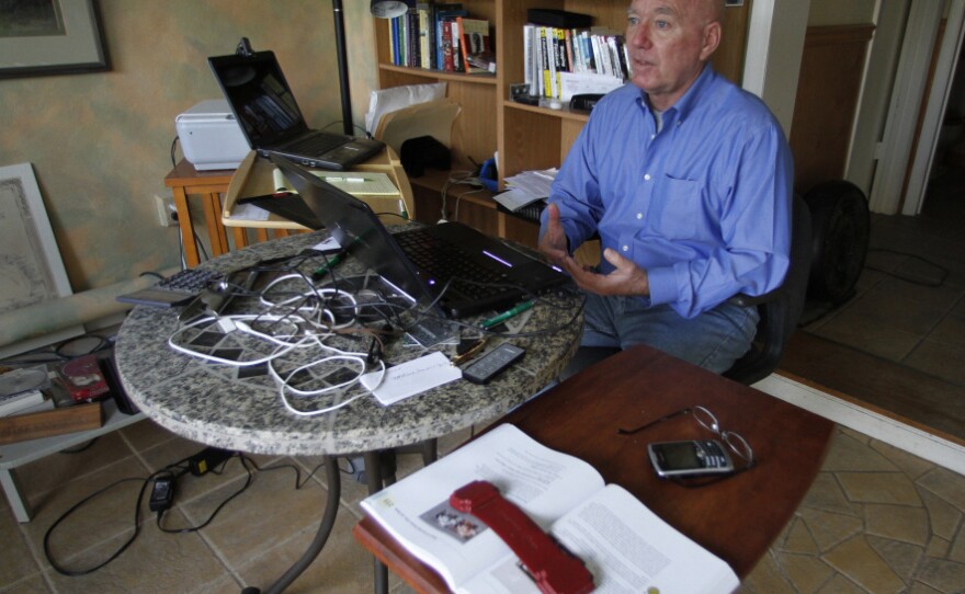 Mike Vanatta, 61, sits in the sunroom of his Vero Beach, Fla., home. Real estate experts debate the effect on the housing market of baby boomers' aging.