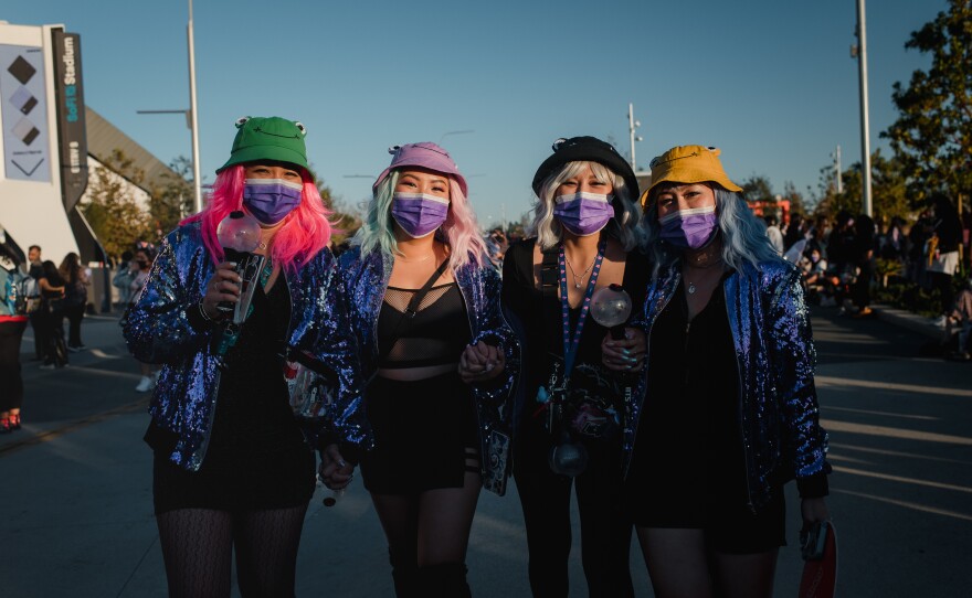 Friends Ravy Sok, Stephanie Tea, Rosemary Millan and Lina Sok walk together outside the SoFi stadium.