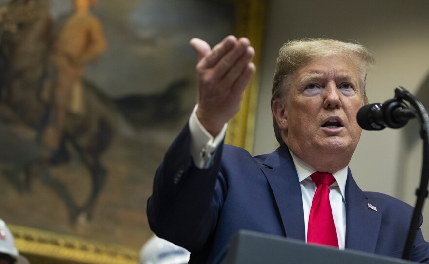 President Trump proposes changes to the National Environmental Policy Act at the White House in January. The final rules aims to speed approval of pipelines and other infrastructure.