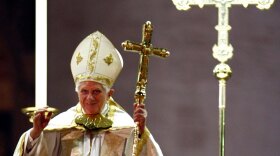 Pope Benedict XVI greets faithful at the end of a meeting Thursday in St. Peter's Square at the Vatican to celebrate the end of the Year of the Priest.