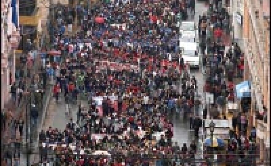 Thousands of Chilean students march during a massive protest rally in the streets of Valparaiso on June 5, 2006 -- part of a nationwide strike to demand education reforms.