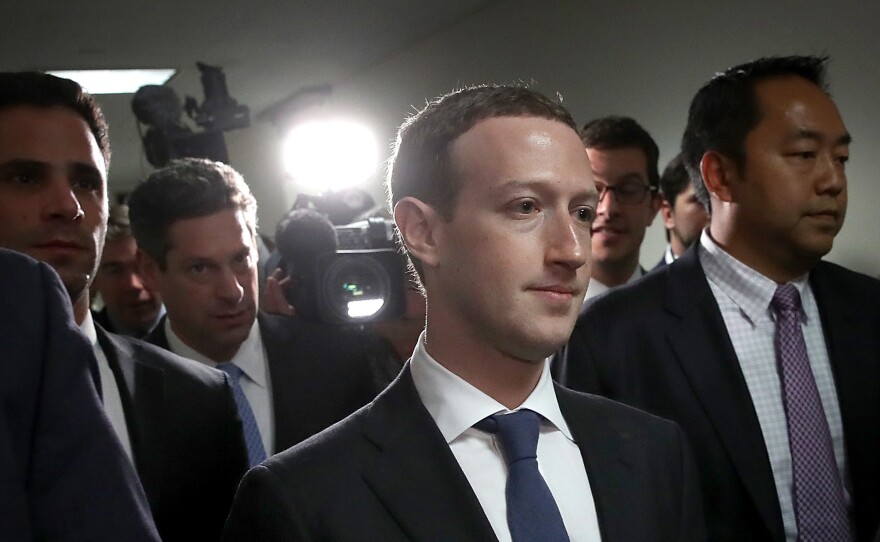 Facebook CEO Mark Zuckerberg leaves the office of Sen. Dianne Feinstein, D-Calif., after meeting with her on Capitol Hill on Monday.