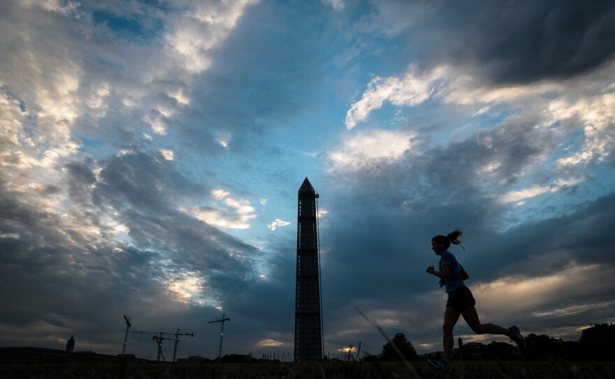 Some things even Washington dysfunction can't touch, like the sight of a new day dawning near the Washington monument.