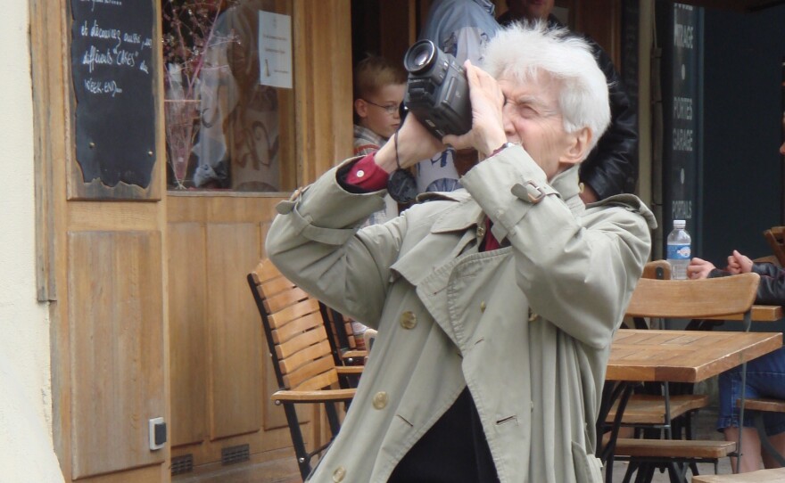 Man with a camera... the spry and sly Monsieur Resnais.