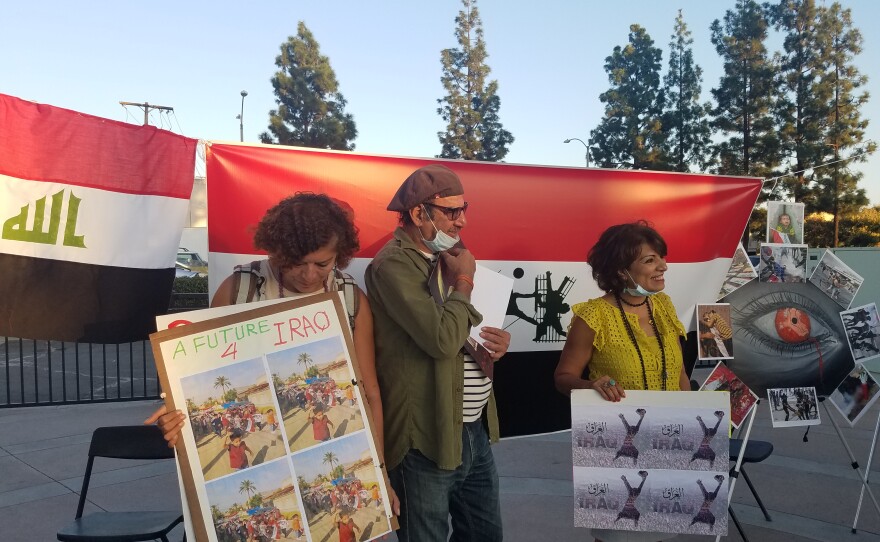 Wedad Schlotte, the vice-president of the San Diego chapter of the American-Arab Anti-Discrimination Committee, helps lead a protest in El Cajon, Nov. 10, 2019.
