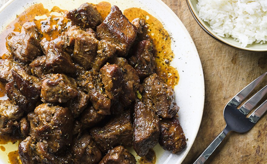 Ikarian Braised Pork with Honey, Orange, and Rosemary, a savory and sweet main course balanced with citrus and herbs