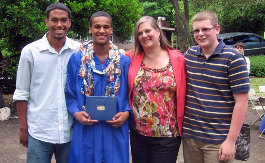 Wilma Stordahl with her sons (from left) Kevin, Kazon and Kenneth at Kazon's high school graduation. "We think of Norwegians as being tall and blond and blue-eyed," Stordahl says. "My sons are tall — but they're not blond and blue-eyed."