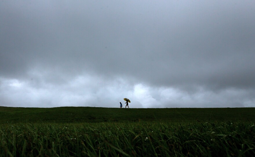 Storm clouds gather above the levee near Lake Pontchartrain as Tropical Storm Cristobal makes landfall on June 07, 2020 in New Orleans.