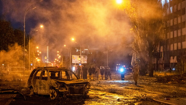 A burned car is seen after a Russian missile attack in Kyiv, Ukraine, Saturday, Aug. 1, 2026. (AP Photo/Dan Bashakov)