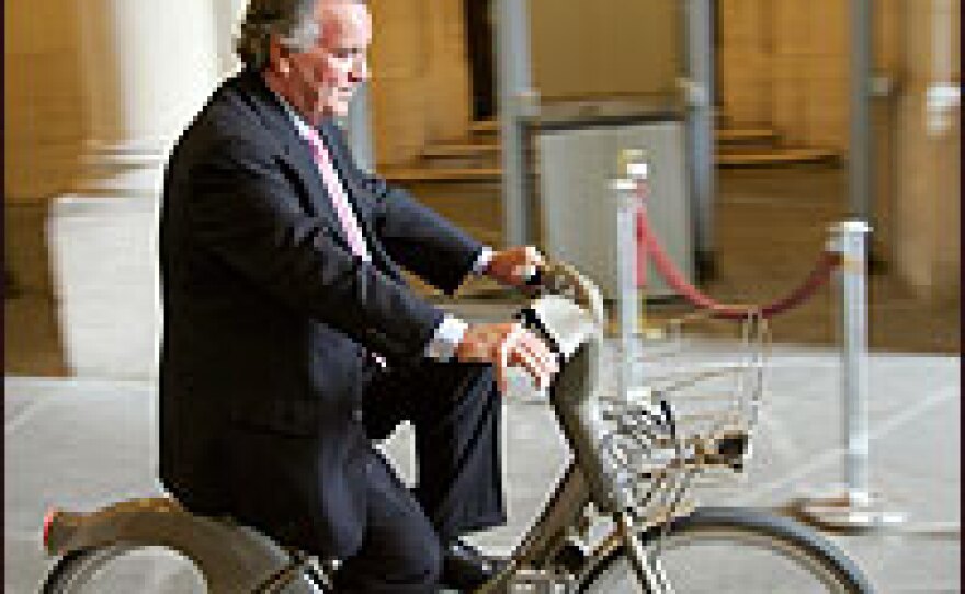 Chicago Mayor Richard Daley tests out a Velib bicycle after leaving Paris Town Hall on Tuesday, Sept. 11.