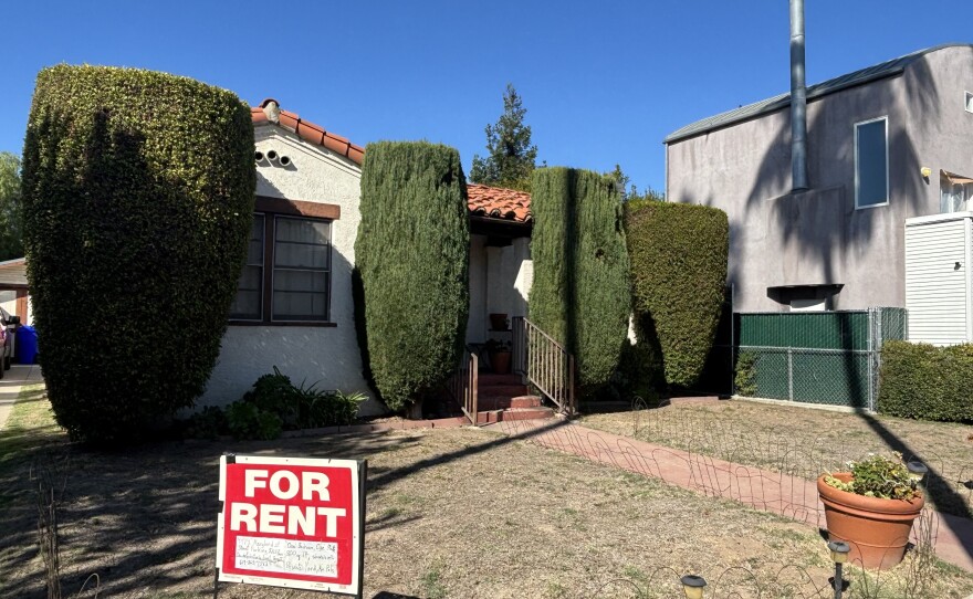 A "for rent" sign is seen in the front yard of a home in University Heights, Oct. 24, 2025.