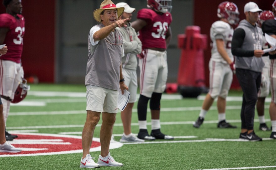 Coach Nick Saban barks plays during a recent Alabama football practice.