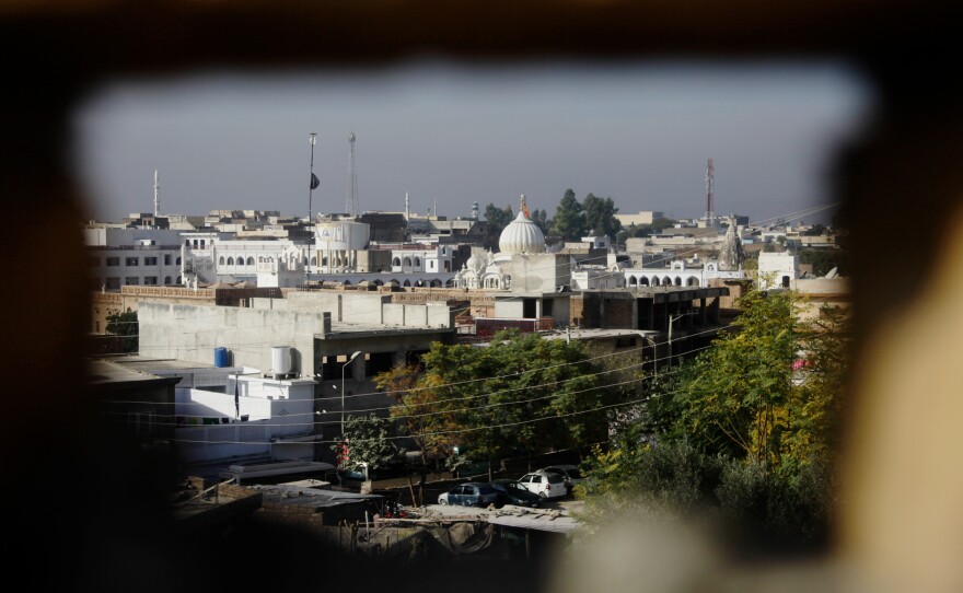 A view of the Sikh holy site, the Gurdwara Panja Sahib in the town of Hasan Abdal in Pakistan. It is one of the many Sikh holy sites that dot the Pakistani province of Punjab. India's Sikhs have struggled to reach these sites for over 70 years.