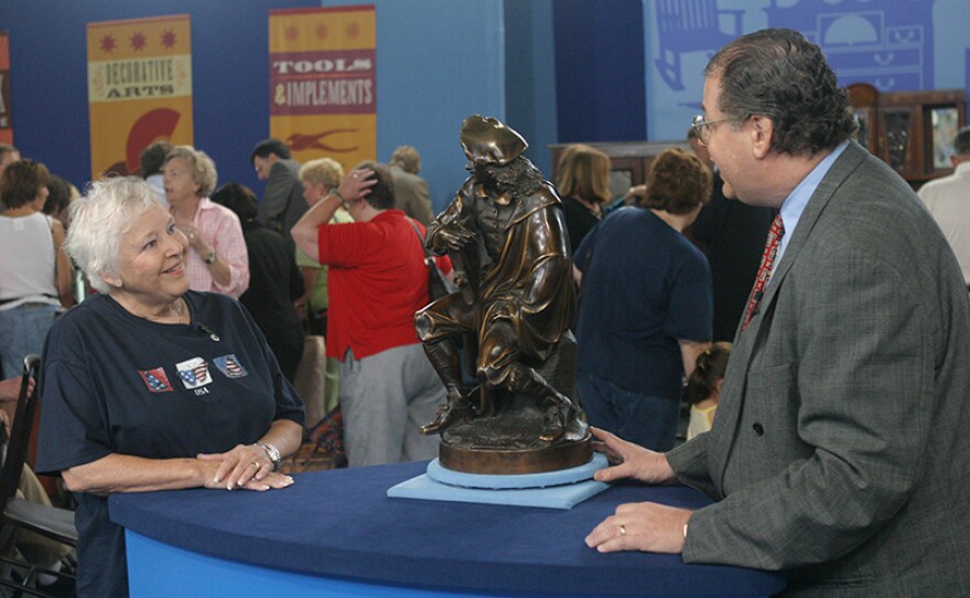 Eric Silver (right) appraises an Albert Carrier-Belleuse sculpture, ca. 1800 in Omaha, Neb.