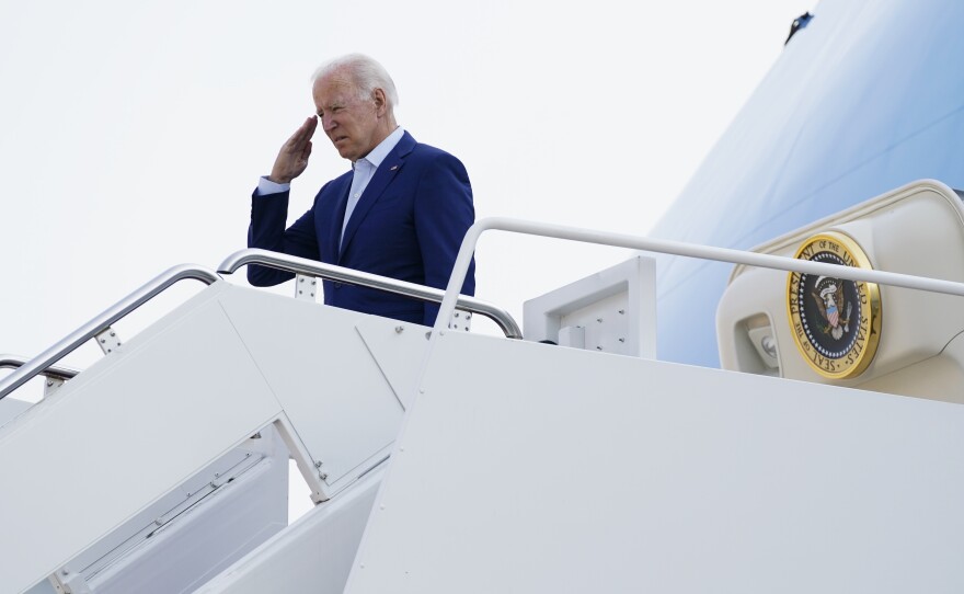 President Joe Biden salutes before boarding Air Force One for a trip to visit the National Interagency Fire Center in Boise, Idaho, Monday, Sept. 13, 2021, in Andrews Air Force Base, Md.