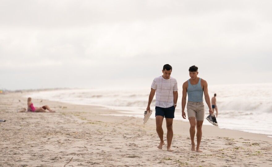 Conrad Ricamora and Joel Kim Booster in <em>Fire Island</em>.