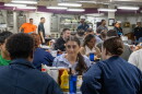 Photo of Rep. Sara Jacobs sitting for a meal with sailors on the mess decks of the USS Abraham Lincoln Sunday, Sept. 27, 2026.