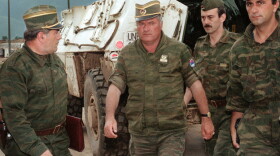 Gen. Ratko Mladic (center), commander of the Serbian forces in Bosnia, arriving at Sarajevo's airport in this photo taken Aug. 10, 1993.