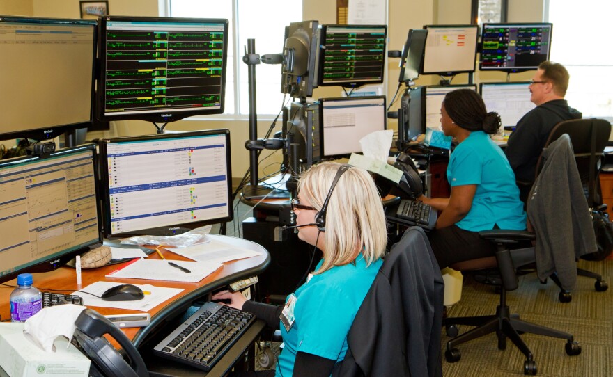 From the left, registered nurses Cassie Gregor, Camellia Douglas and Mike Montalto monitor patients in intensive care units scattered around North Carolina.