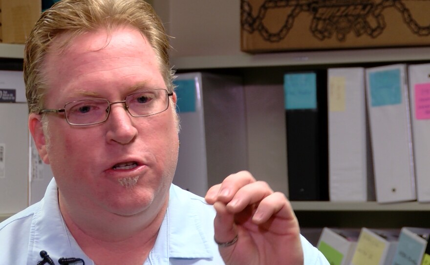 Attorney Cory Briggs speaks at a news conference, April 12, 2016.