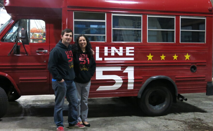 Teachers P.T. and Leti Lovern remodeled a school bus to deliver beer. They named the bus Half Pint for their brewing company Line 51.