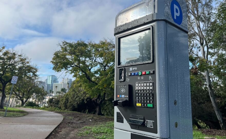 A new parking meter in Balboa Park stands beside a cement path on Jan. 7, 2026.