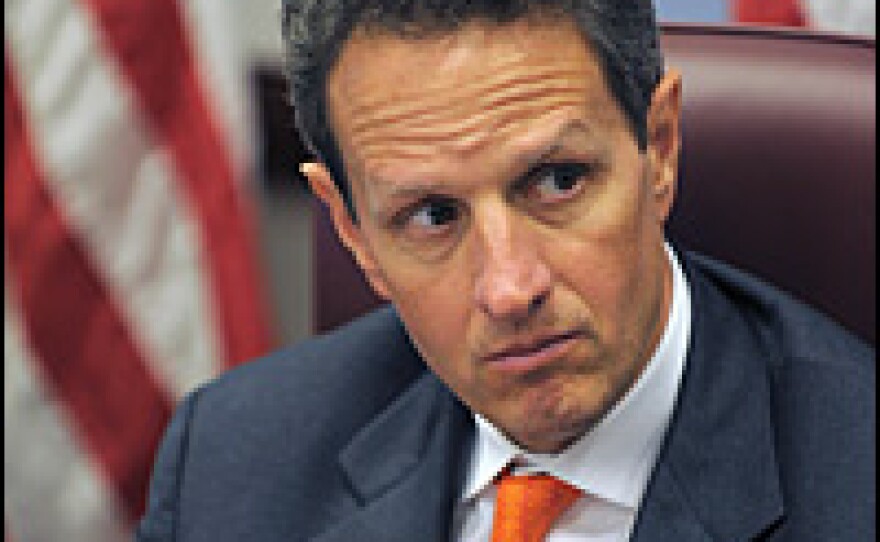 Timothy Geithner, President-elect Obama's pick for Treasury secretary, watches as Obama speaks after a meeting with members of his economic team last week.