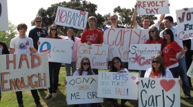 Tea Party activists and supporters of Republican U.S. Senate candidate Carly Fiorina hold up signs at the Anti-Tax Rally at Tuna Park in downtown San Diego on April 15, 2010.