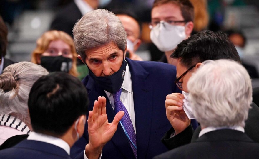 U.S. Climate Envoy John Kerry negotiates on the last day of the COP26 climate summit. Many nations said they were walking away disappointed, but supported the agreement to keep climate action moving forward.