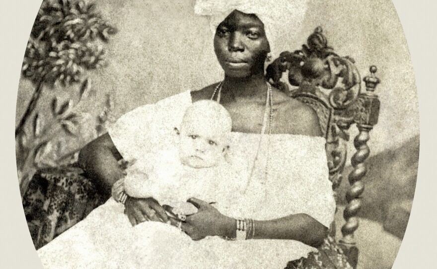 A nanny with child, photographed in 1870 in Salvador de Bahia.