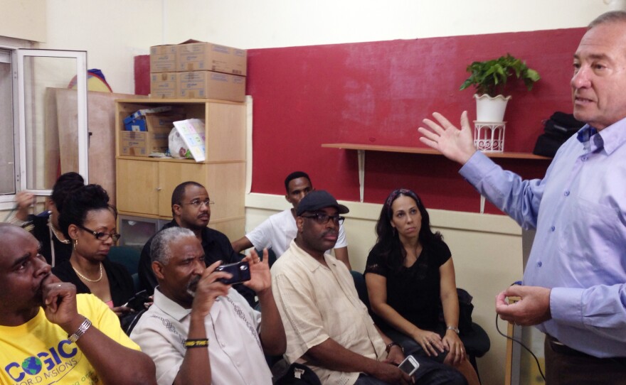 Rabbi Yechiel Eckstein, founder of the International Fellowship of Christians and Jews, welcomes Church of God in Christ leaders to a migrant assistance center in Tel Aviv.