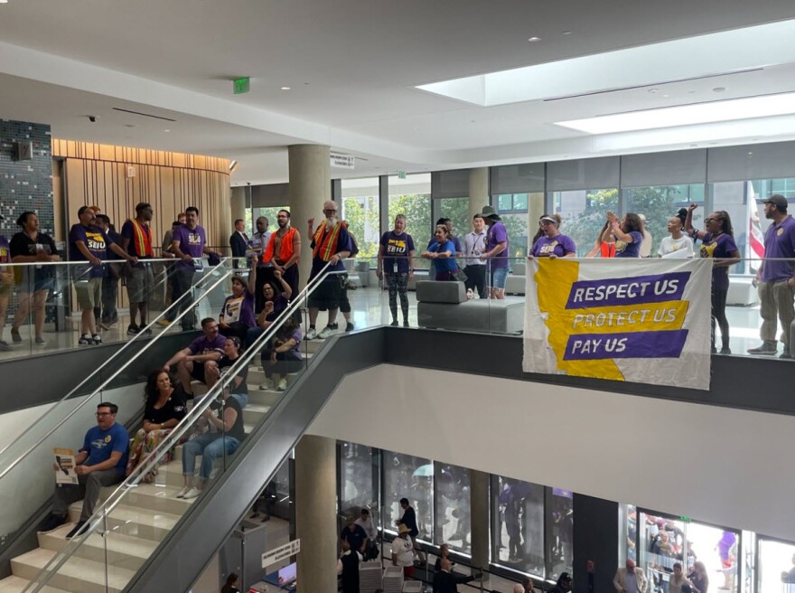 State workers with SIEU Local 1000, along with labor allies and Sacramento Council members Katie Valenzuela and Caity Maple, occupy the ground floor of the office building where state lawmakers work. Aug. 16, 2023. Sacramento, Calif.