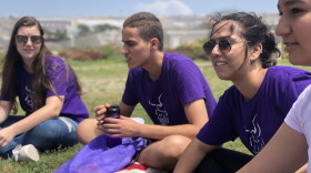 Israeli and Palestinian teenagers sit and talk about the Israeli-Palestinian conflict at Friendship Park near the U.S. and Mexico Border, July 24, 2018.
