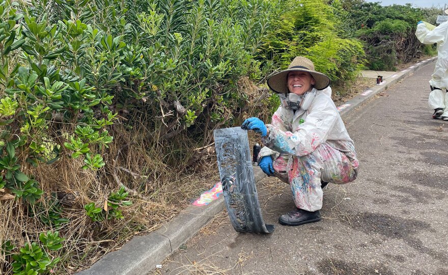 Artist Margaret Noble is shown on July 6, 2022 at the site of her Park Social installation, Plumosa Park in Point Loma.