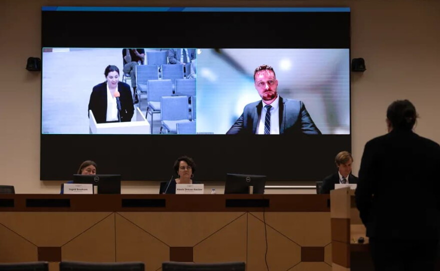 At right, Board Member Rhys Williams appears on a screen as California Department of Toxic Substances Control Director Katie Butler addresses the California Environmental Protection Agency Board of Environmental Safety at CalEPA headquarters in Sacramento on July 23, 2026. Williams attended the meeting virtually.