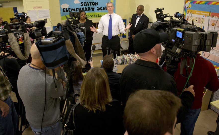 Washington, D.C.: Education Secretary Arne Duncan answers questions after speaking about the administration's priorities for education at Seaton Elementary in Washington. Duncan said that testing U.S. schoolchildren annually in math and reading is critical for measuring their educational progress.