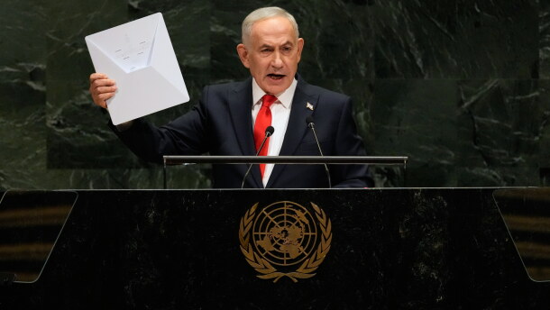 Israeli Prime Minister Benjamin Netanyahu holds up a Starlink satellite internet dish a he speaks during the 81st session of the United Nations General Assembly at United Nations headquarters, Thursday, Sept. 24, 2026.