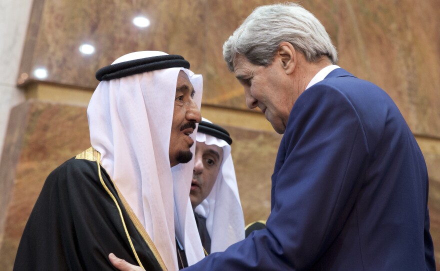 Secretary of State John Kerry greets new Saudi King Salman in Riyadh on Tuesday. the city of Boston fined Kerry $50 on Thursday for failing to clear his sidewalk after this week's massive snowstorm.