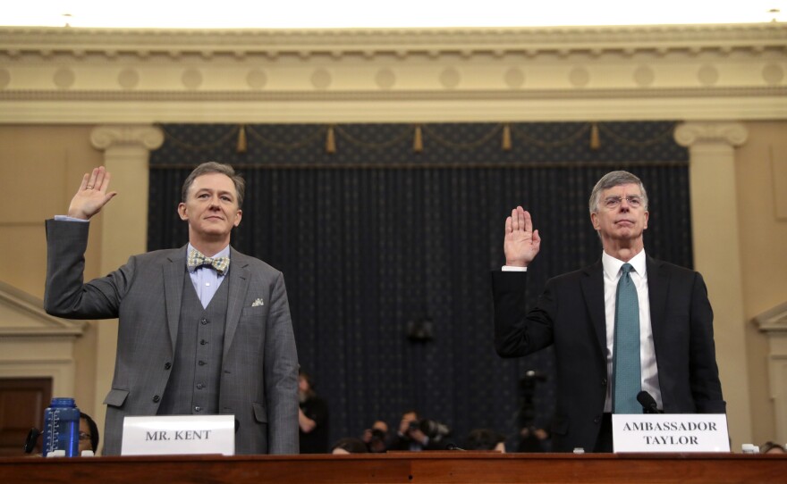 Top State Department official George Kent (left) and acting U.S. Ambassador to Ukraine William Taylor are sworn in to testify during the first public Trump impeachment hearing on Wednesday.