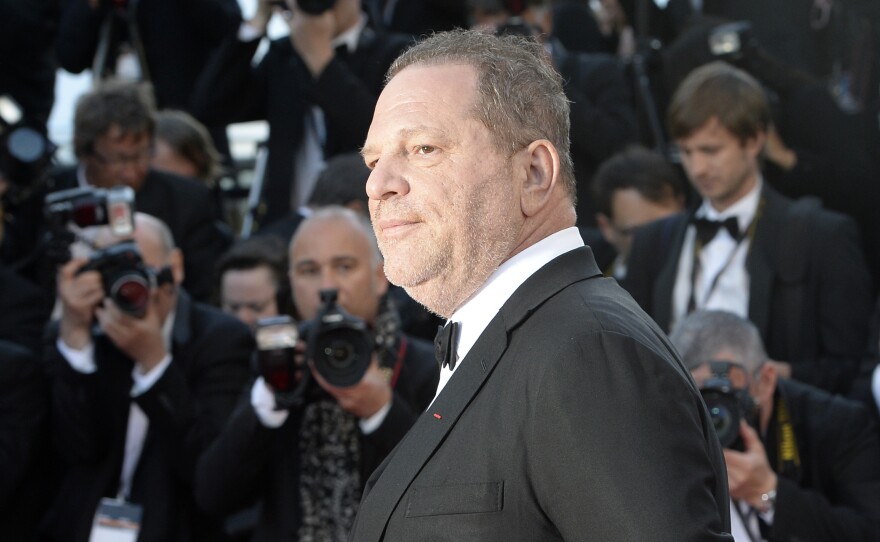 Harvey Weinstein poses on the red carpet of the 2013 Cannes Film Festival. Weinstein is the subject of numerous allegations of sexual harassment spanning decades.