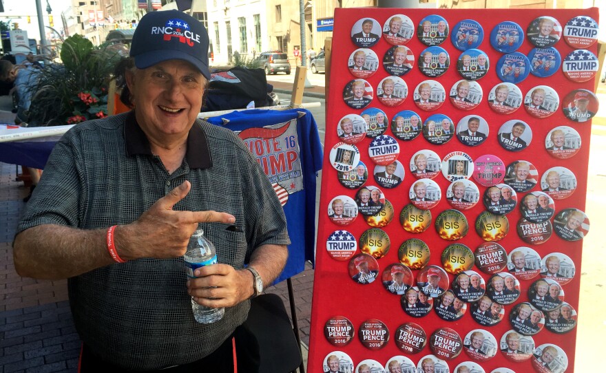 Vendor Larry Rich agrees with the message of the merchandise he sells in Cleveland. "I'm with Trump all the way," he says.