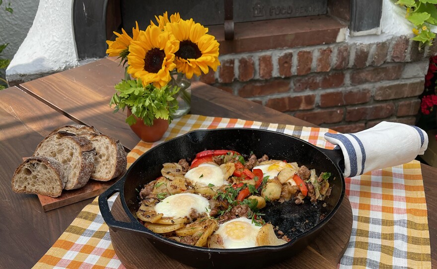 A one-skillet breakfast wonder, fried potatoes with sausage and eggs, packed with protein in every bite and all served up on a crispy bed of fried potatoes.