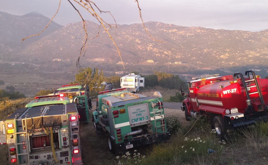 Firetrucks from the San Diego County Fire Department and the U.S. Forest Service were part of the equipment sent to respond to the Wildcat fire near Lakeside, June 17, 2015.