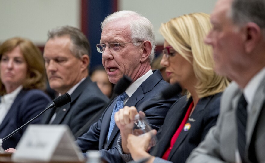 Capt. Chesley "Sully" Sullenberger, accompanied by other pilots and former FAA administrator Randy Babbitt, speaks during a House Committee on Transportation and Infrastructure hearing on the status of the Boeing 737 Max in Washington, D.C.
