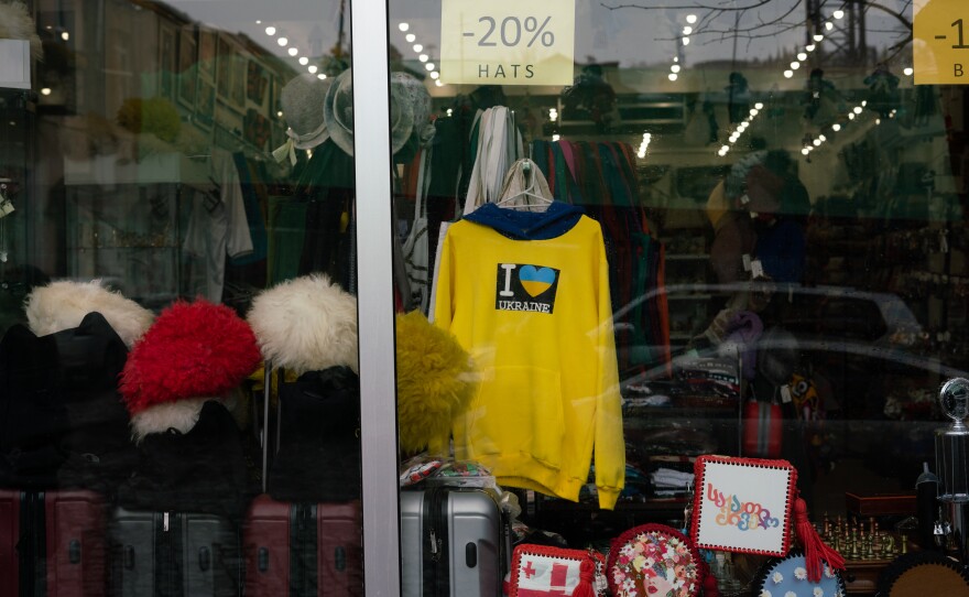 A pro-Ukraine shirt hangs in the window of a souvenir shop in downtown Tbilisi, Georgia.