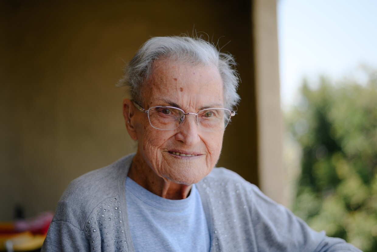 Erma Currier stands for a portrait at her home in Chula Vista on July 23, 2024. Earlier this year, the city towed Erma’s car for violating the three day-parking limit.