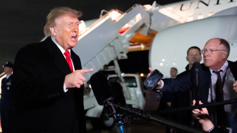 President Donald Trump speaks with reporters as he arrives on Air Force One, Saturday, Oct. 10, 2026, at Joint Base Andrews, Md.