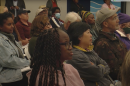 Neighbors pack a community room at KIPP Adelante Preparatory Academy for the Chollas Valley Community Planning Group on Monday, Oct. 28, 2024.
