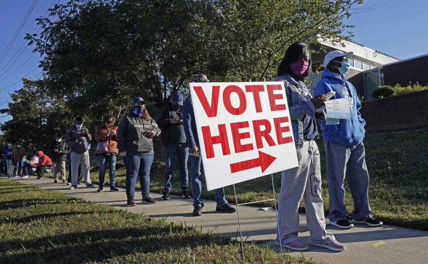 Voters line up to cast their ballots in the 2020 presidential election in Durham, N.C. The U.S. Supreme Court has agreed to hear a North Carolina redistricting case this fall about how much power state legislatures have over how federal elections are run.