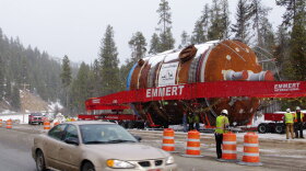 A coke drum waits along Montana's U.S. Highway 12 during a dry-run shipment in early March. The load can travel only late at night and is destined for a new oil refinery in Billings, Mont.